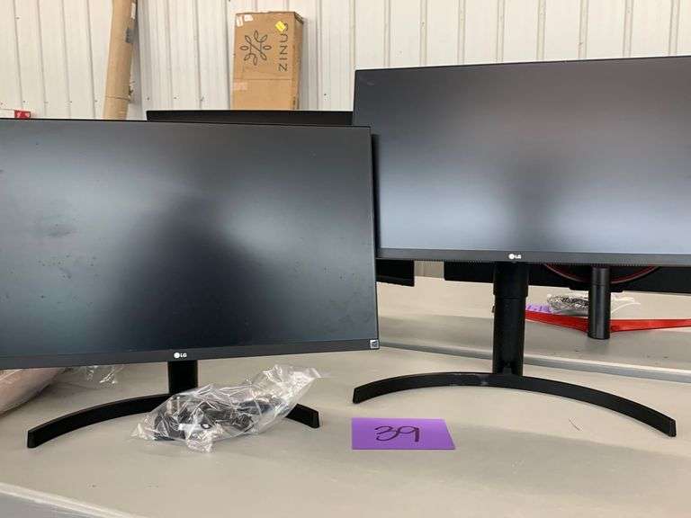 (2) LG MONITORS W/ CORDS Earl's Auction Company