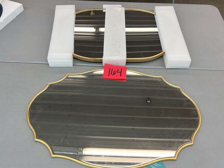 (2) ASSORTED GOLD WALL MIRRORS Earl's Auction Company