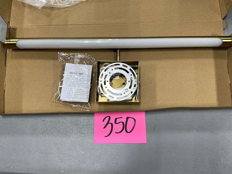 VANITY LIGHT IN BOX Earl's Auction Company