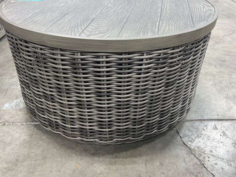 ALL WEATHER WICKER STORAGE COFFEE TABLE Earl's Auction Company