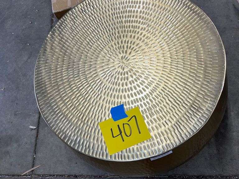 GOLD FINISH ROUND STORAGE COFFEE TABLE Earl's Auction Company