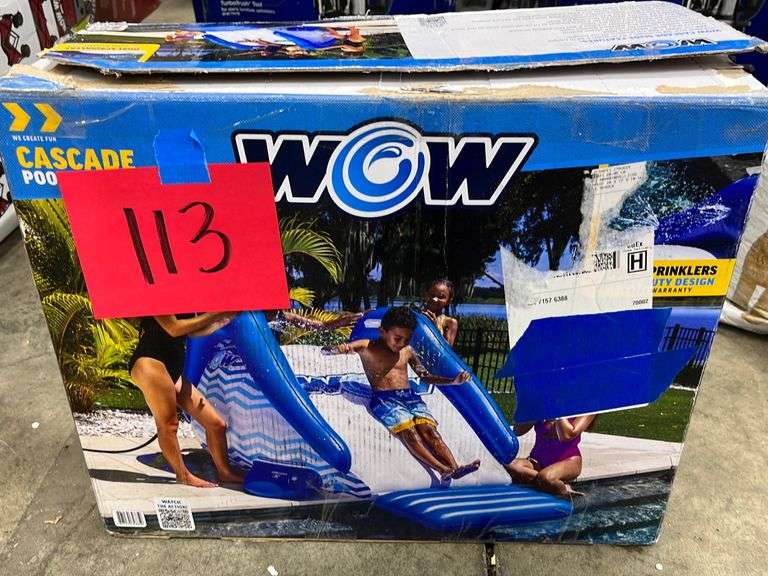 WOW POOL SLIDE IN BOX Earl's Auction Company