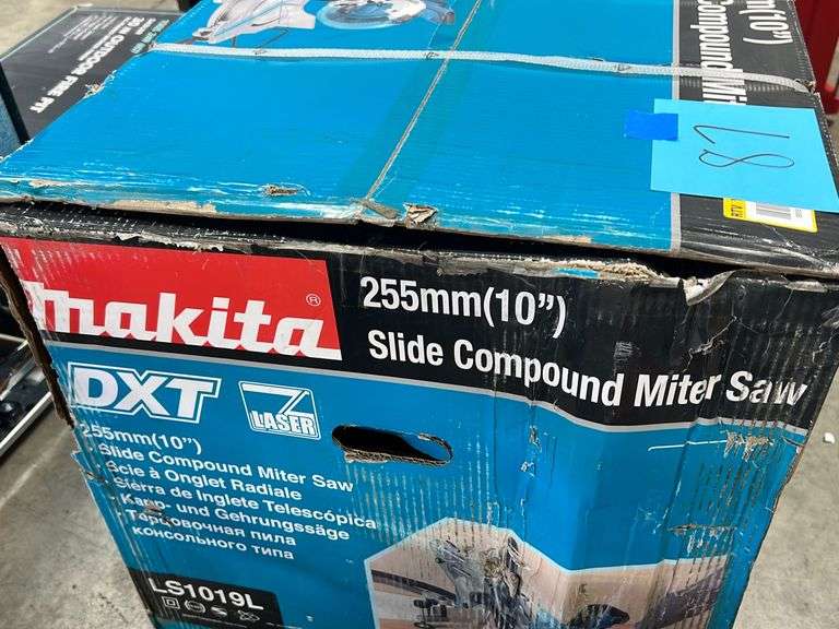 MAKITA DXT 10" SLIDE COMPOUND MITER SAW IN BOX Earl's Auction Company