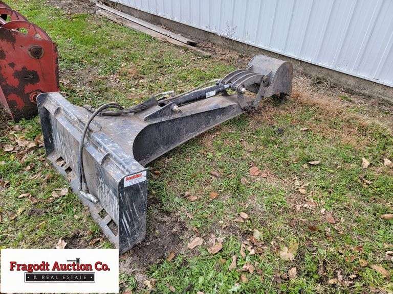 Jenkins Skidsteer Backhoe attachment with 12’’ Bucket. Used only 1 time