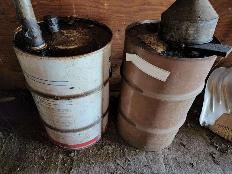 (2) Oil Barrels 1 is Approx. ½ Full Fragodt Auction and Real Estate LLC