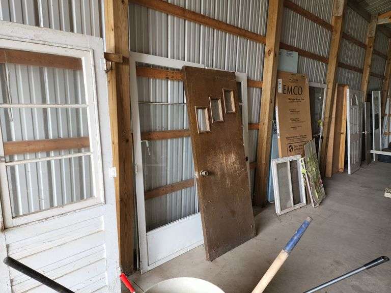 Assortment of Used Doors Fragodt Auction and Real Estate LLC