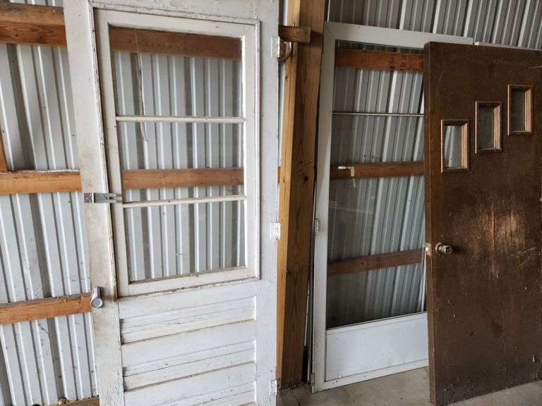 Assortment of Used Doors Fragodt Auction and Real Estate LLC
