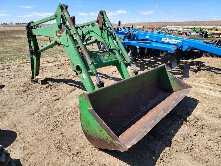 John Deere 740 Self Leveling Loader with 91” Quick Tach Bucket, SN 10299 Fragodt Auction and