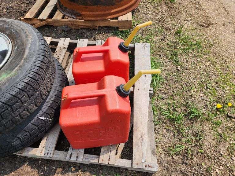 (2) 5 Gallon Gas Cans, Buying All One Money Fragodt Auction and Real Estate LLC
