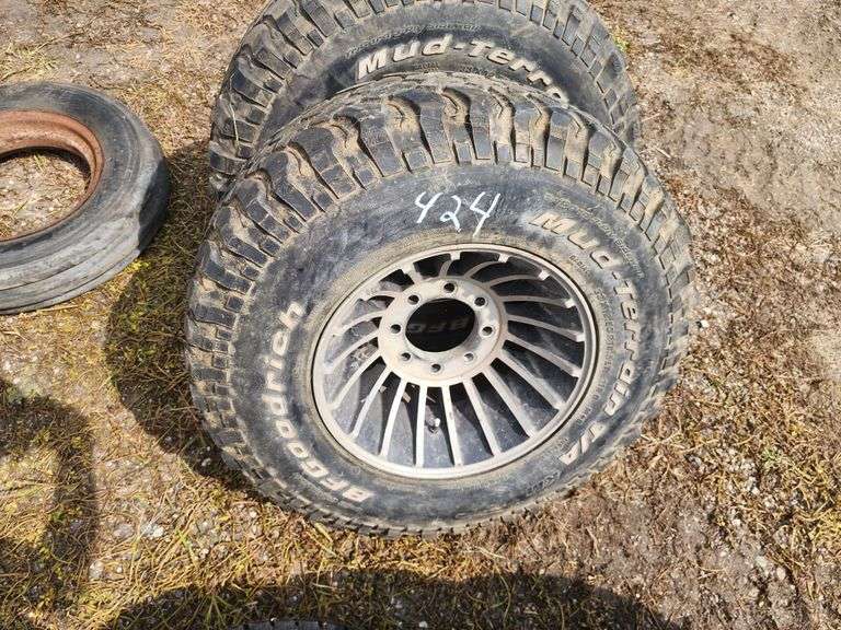 Set of 4 Rims, 2 33 x 12.5 x 16.5 Tires, 8 Bolt Ford Rims. Buying All