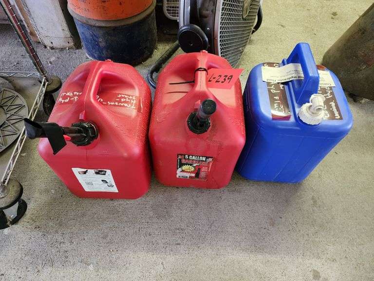 5 Gallon Gas Can, 5 Gallon Transmission Fluid (Full), 5 Gallon