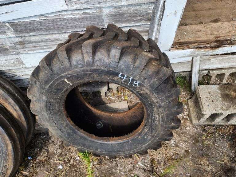 12 16.5 Skid Steer Tire Fragodt Auction and Real Estate LLC