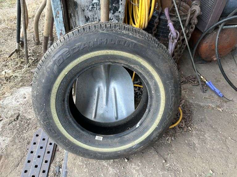 New P205/75R14 Tire Fragodt Auction and Real Estate LLC