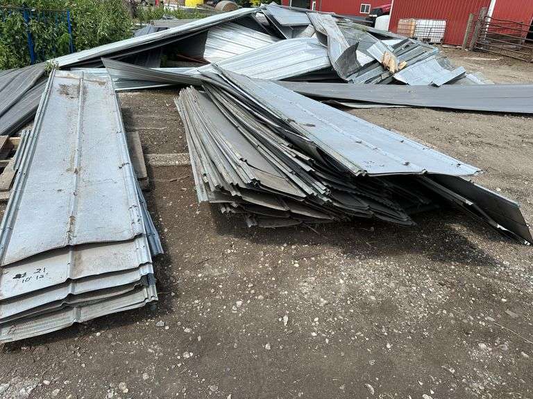 Approx 70 Sheets of 10 and 12’ Galvanized Pole Barn Tin (Used). Buying