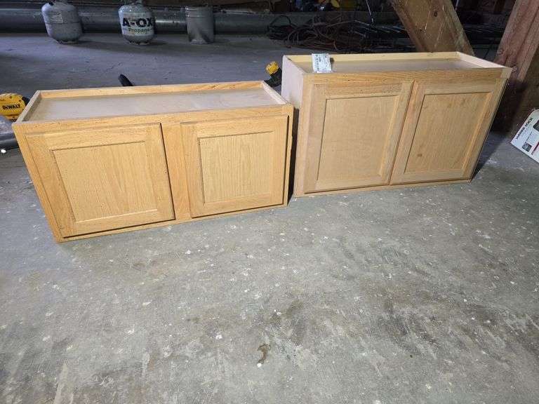 2- UNFINISHED CABINETS. 1- OAK 30" W X 15" H X 12" D. 1- 29 3/4" W X 18" H X 12" D.