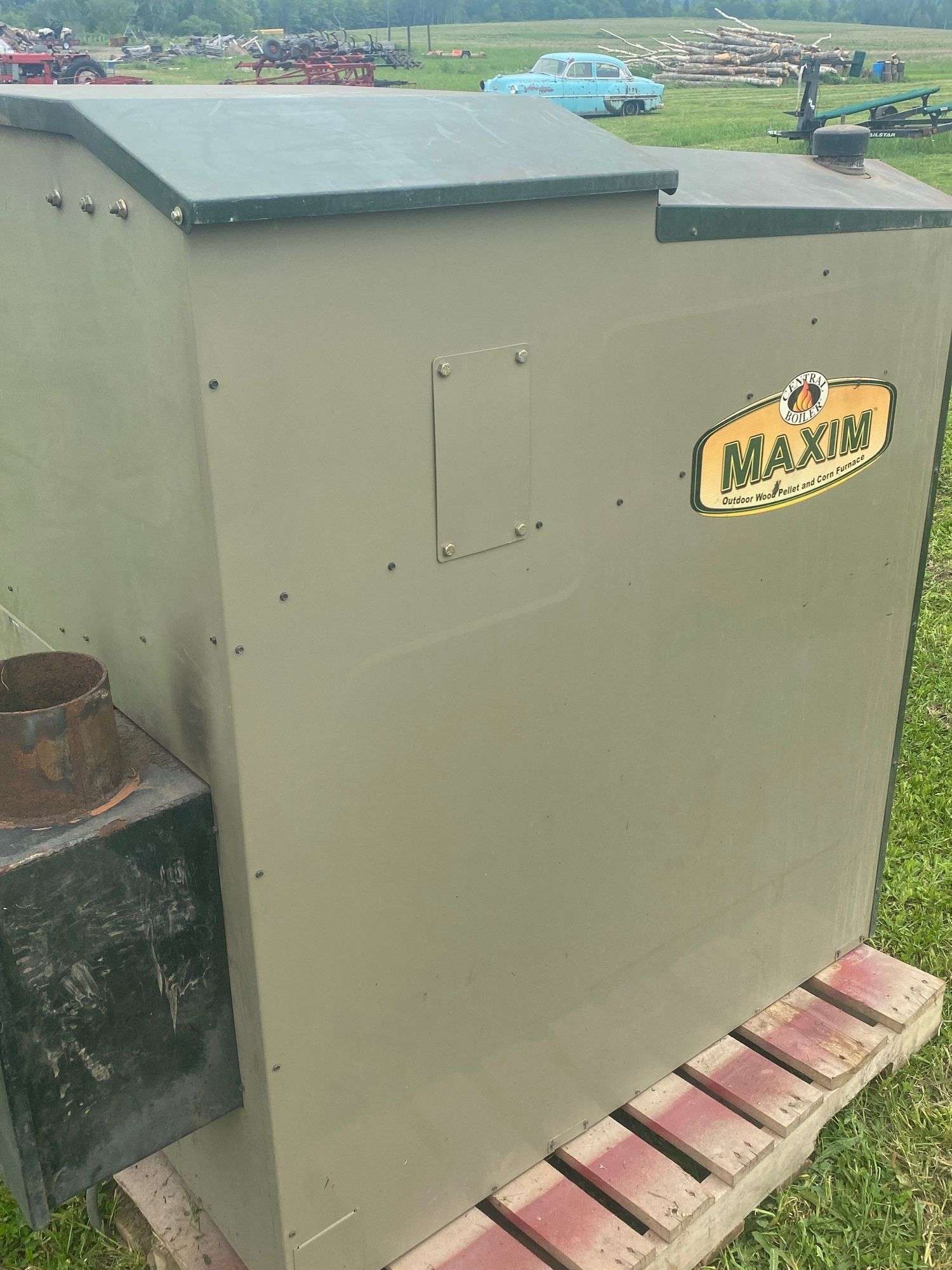 Central Boiler outdoor pellet/ corn furnace w/hopper - Gregg Auctions