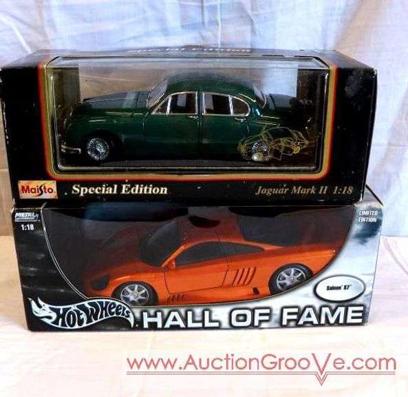 Set of two die cast metal cars. 1/18" scale. All in original boxes. Saleen 87. 1959 Jaguar Mark
