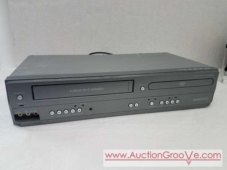 Magnavox VHS and DVD player VCR, model DV225MG9C. 2013 Funai