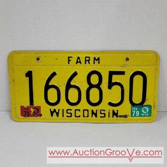1974 Wisconsin Farm License Plates Front and Back. A AuctionGrooVe
