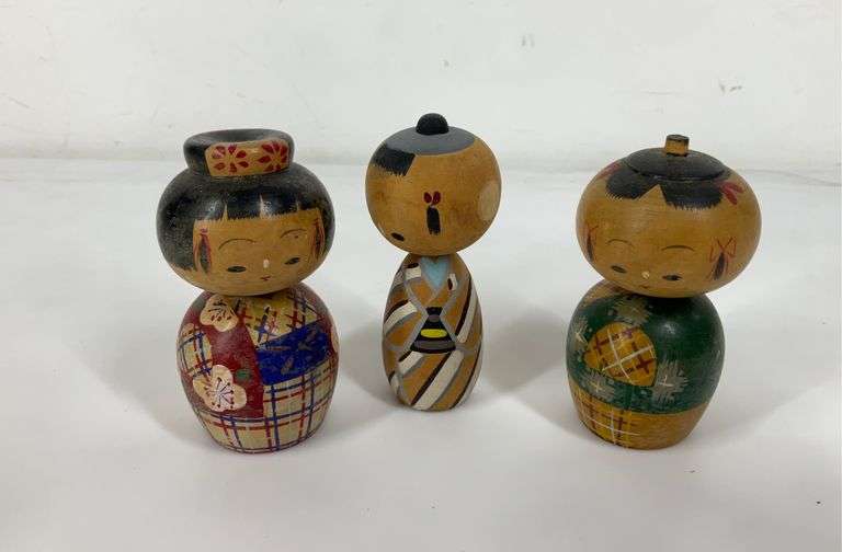 Three Japanese wooden dolls Hash Auctions