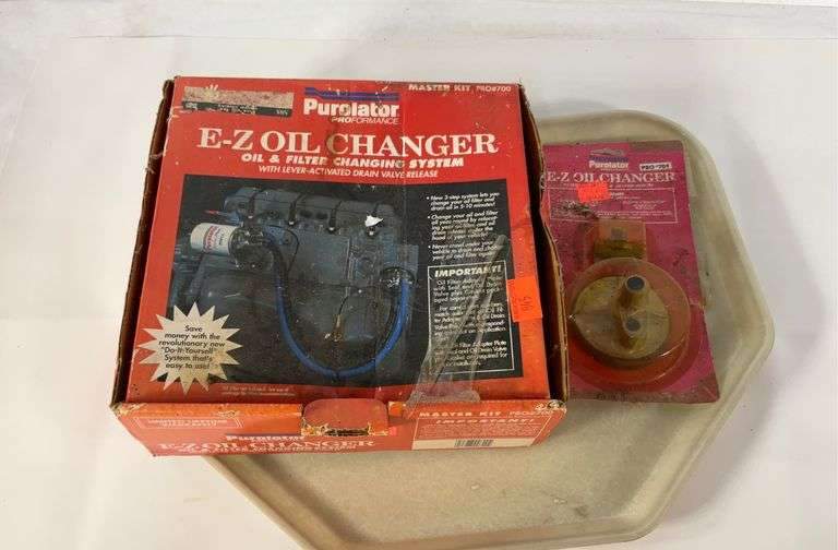 EZ oil Changer system and oil filter adapter plate Hash Auctions