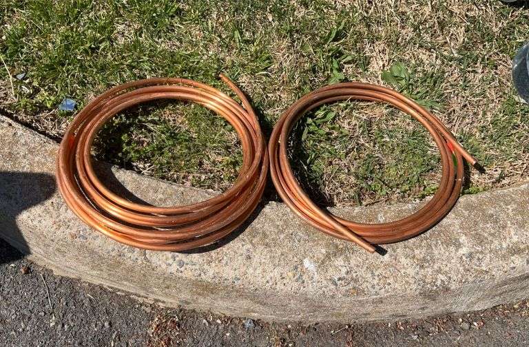 Copper water line type tubing, two partial coils. Hash Auctions