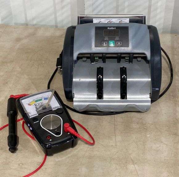 Gold testing machine and currency counter, both used. Hash Auctions