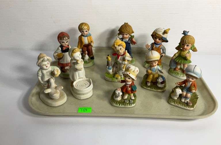 Bisque porcelain figurines, some marked Homco Hash Auctions
