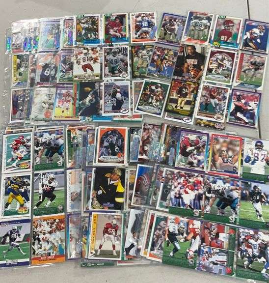 Football cards in 9 sleeve sheets. Various years and brands Hash Auctions