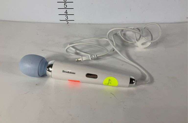Brookstone massager. Electric. Powers on. Hash Auctions