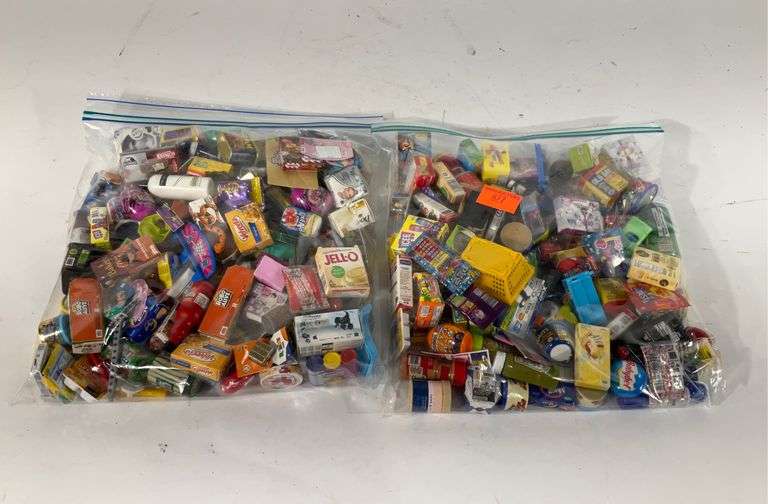 Two ziplock bags full of miniature items, includes toys, foods, beauty