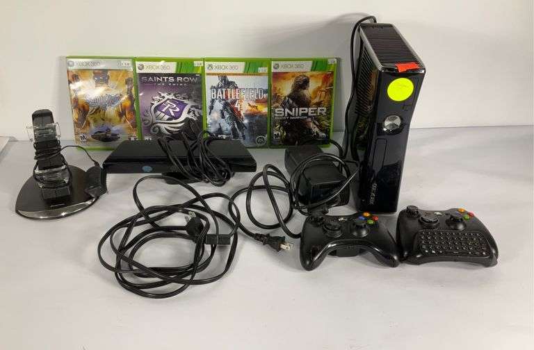 Xbox 360. Does power on has cords, two controllers, charging station