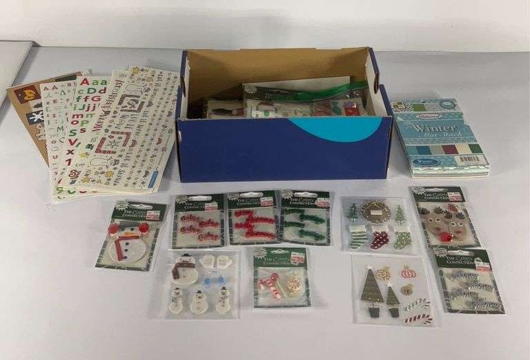 Small box of scrapbooking/ card making supplies. Hash Auctions