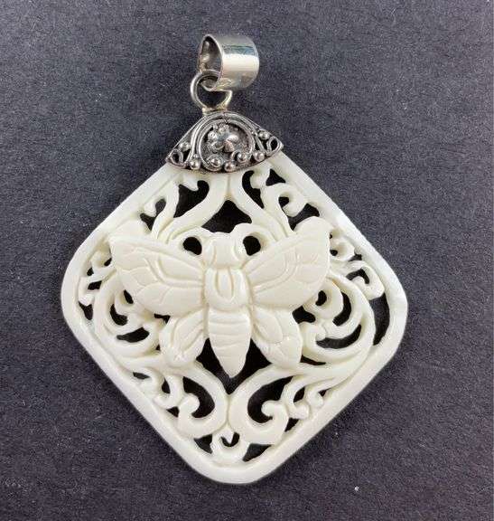 Sterling silver carved bone butterfly pendant Hash Auctions