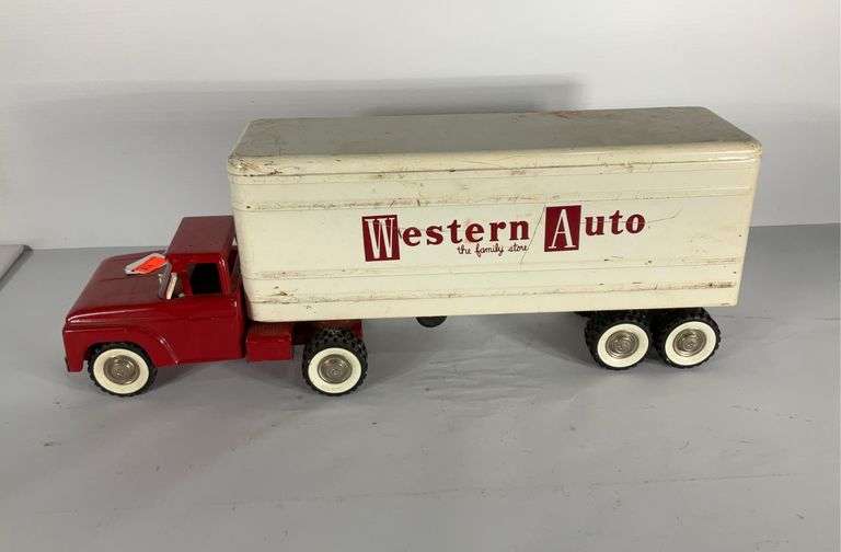 Western Auto the family store metal truck and trailer. Hash Auctions