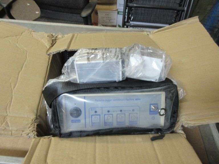 PORTABLE OXYGEN CONCENTRATOR Dallas Online Auction Company