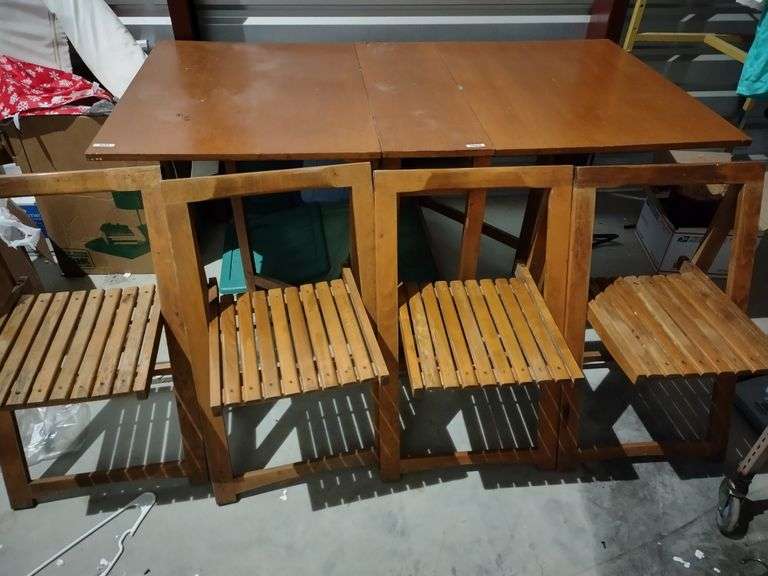 WOODEN FOLDING TABLE AN 4 CHAIRS BOTH SIDES FOLD DOWN AN CHAIRS GO