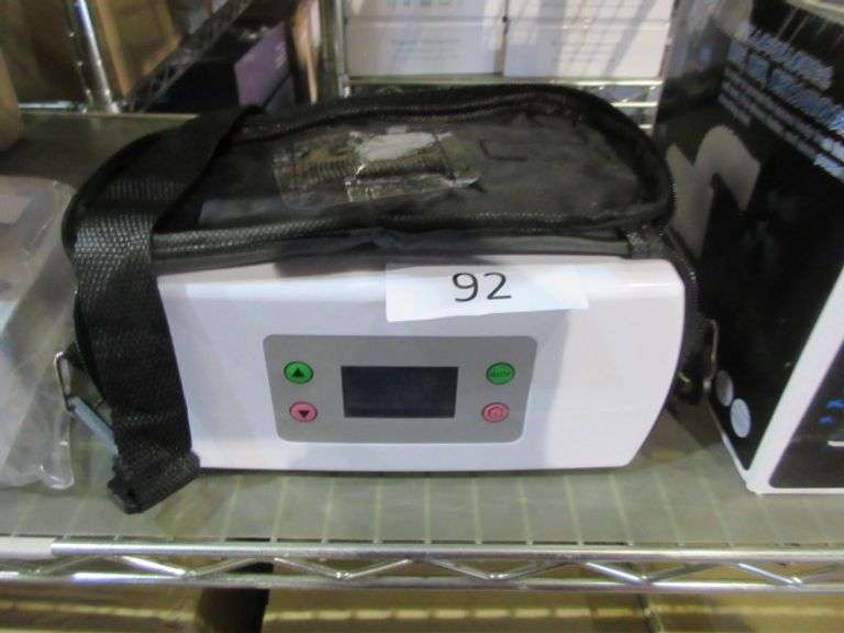 PORTABLE OXYGEN CONCENTRATOR Dallas Online Auction Company