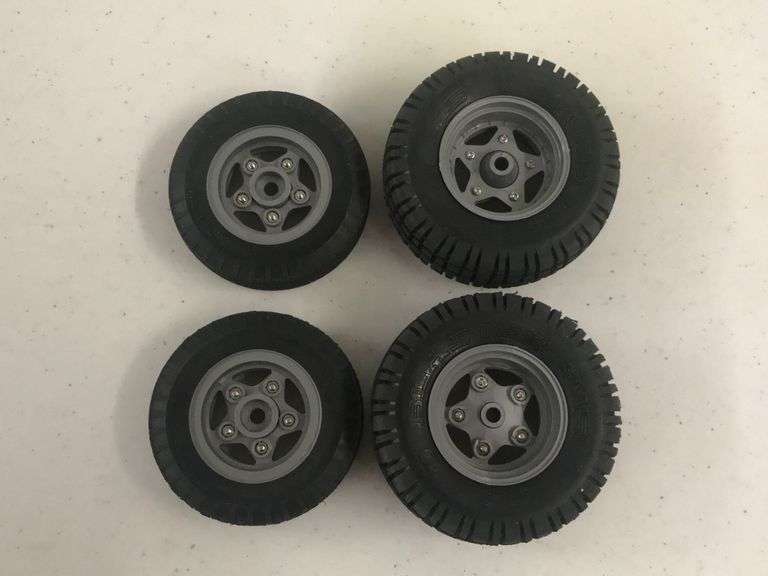 Tamiya Sand Blaster 915 tires on rims Integrity Auctioneers