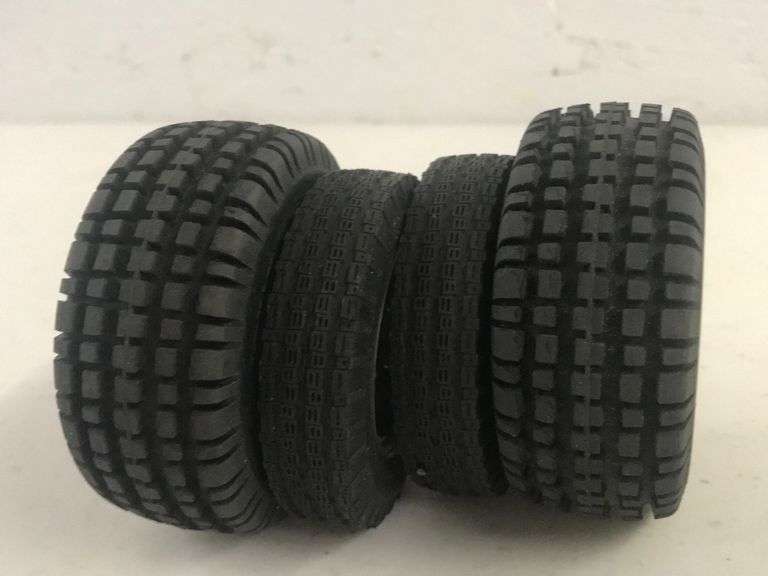 Tamiya Sand Blaster 915 tires on rims Integrity Auctioneers