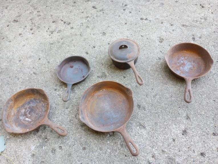 Cast iron lot with Griswold + Wagner Integrity Auctioneers