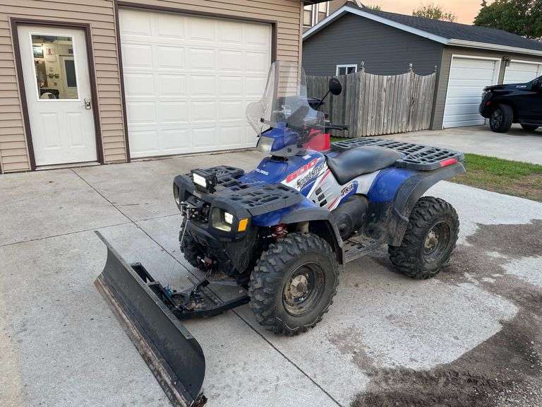 2004 Polaris Sportsman 600 with plow - Integrity Auctioneers