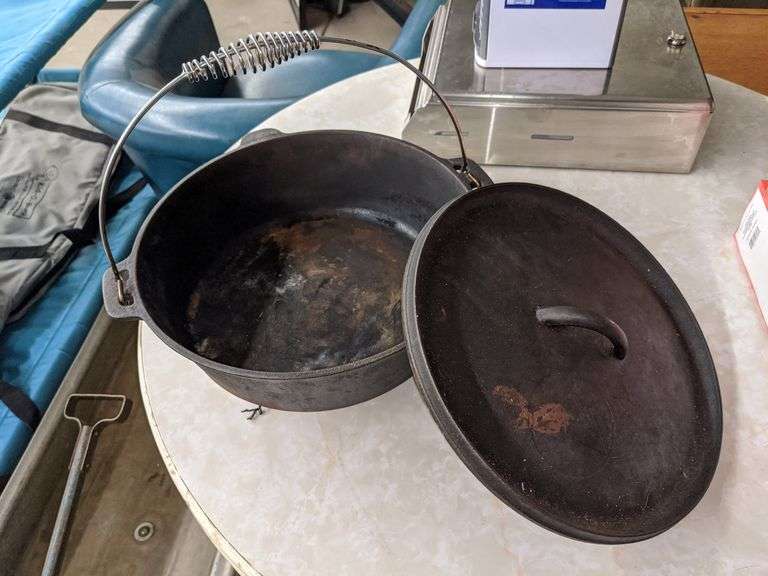 OZARK TRAIL CAST IRON DUTCH OVEN Isabell Auction