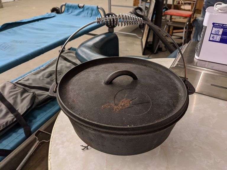 OZARK TRAIL CAST IRON DUTCH OVEN Isabell Auction