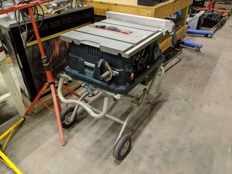MASTERFORCE 10IN. CONTRACTOR TABLE SAW WITH FOLDING/ROLLING STAND Isabell Auction