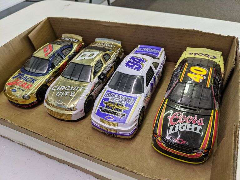 LOT OF (4) 124 SCALE DIECAST RACE CARS Isabell Auction