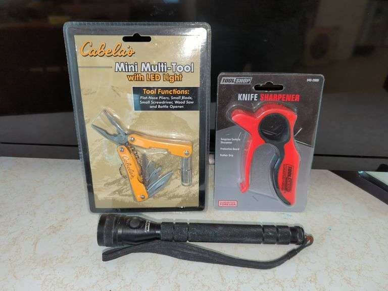 MULTITOOL, KNIFE SHARPENER, & FLASHLIGHT Isabell Auction