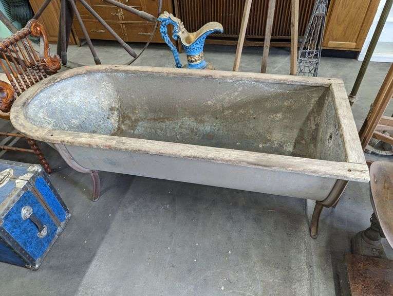 VINTAGE GALVANIZED COWBOY BATHTUB WITH LEGS & WOOD TRIM (66"L X 22"T X