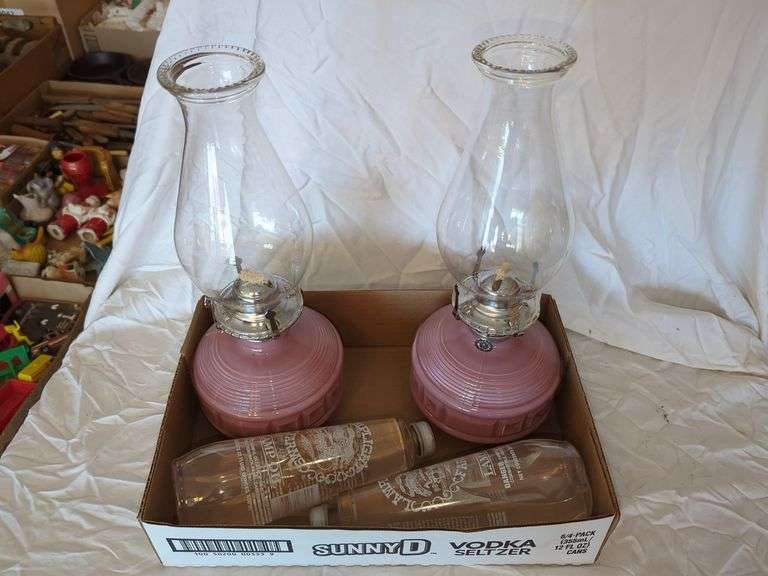 (2) PINK OIL LAMPS WITH CHIMNEYS & LAMP OIL Isabell Auction