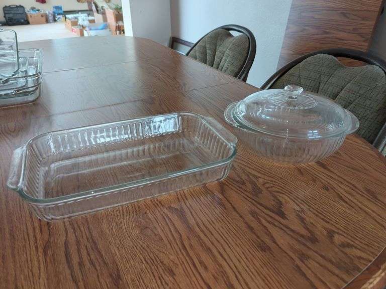 (2) GLASS BAKING DISHES ((1) WITH LID....CHIP ON BOTTOM OF HANDLE